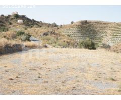 Parcela rústica con vistas a la montaña y ciudad