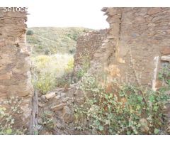 Parcela rústicas con casa en ruinas de 45 m2 con buenas vistas