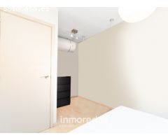 Piso con ascensor en finca de obra vista con la ITE pasada