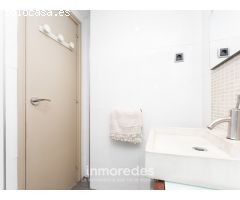 Piso con ascensor en finca de obra vista con la ITE pasada