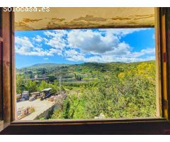 Edificio de tres alturas por terminar en Gata de Gorgos con vistas al cauce del