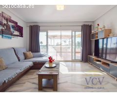 Vive la Exclusividad: Piso de Ensueño con Terraza, Vistas al Mar y Urbanización