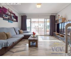 Vive la Exclusividad: Piso de Ensueño con Terraza, Vistas al Mar y Urbanización