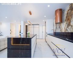 Exclusividad y Diseño con Vistas al Mar: Piso de Lujo Reformado