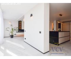 Exclusividad y Diseño con Vistas al Mar: Piso de Lujo Reformado