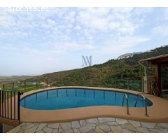 Villa de 3 habitaciones con vistas panorámicas al mar y montañas en Monte Pego.