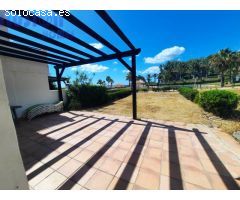 Chalet adosado en primera linea de playa con vistas al mar y jardín