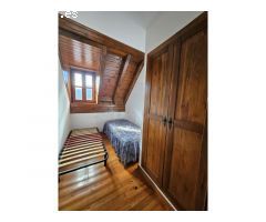 Casa adosada de tres habitaciones con terraza y vistas a la montaña