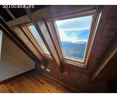 Casa adosada de tres habitaciones con terraza y vistas a la montaña