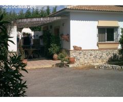 ENCANTADORA FINCA CON DOS CASAS Y DOS APARTAMENTOS