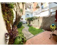 Encantadora casita de pueblo con patio