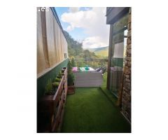Piso de dos habitaciones con terraza, jardín y plaza de parking