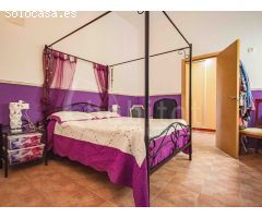 Finca con piscina privada, tierra de cultivo y balsa comunitaria a la venta en