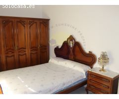 Casa independiente con huerto y cochera.
