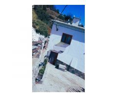 Acogedora casa de pueblo con estudio.