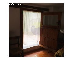 Acogedora casa de pueblo con estudio.