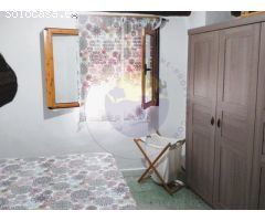 Acogedora casa de pueblo con estudio.
