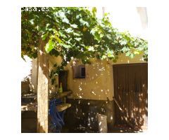 Acogedora casa de pueblo con estudio.