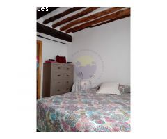 Acogedora casa de pueblo con estudio.