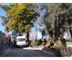 CASA CON PARCELA