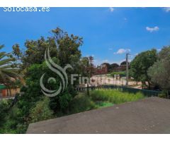 TERRENO PLANO CON CASITA PARA REFORMAR