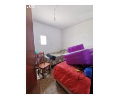 Casita Adosada en Primera Línea de Playa en Caleta de Vélez: 2 Plantas y Cerca