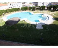 APARTAMENTO DE TRES DORMITORIOS EN URBANIZACIÓN PRIVADA CON JARDINES Y PISCINA.