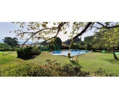 Preciosa casa de estilo indiano con piscina y vistas a la ría
