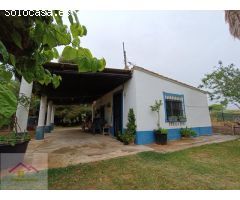 CASA CON TERRENO