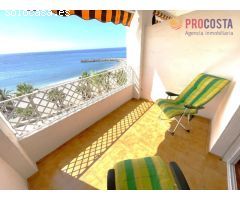 PISO REFORMADO EN 1ª LÍNEA DE PLAYA VELILLA CON PISCINA COMUNITARIA