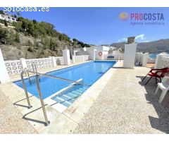 PISO REFORMADO EN 1ª LÍNEA DE PLAYA VELILLA CON PISCINA COMUNITARIA