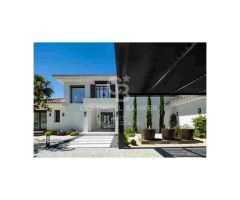Increíble villa contemporánea en primera línea de golf en el corazón de Nueva