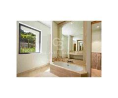Sofisticada villa de estilo ibicenco en prestigiosa Finca Cortesín, Casares