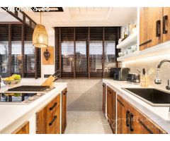 Exclusiva planta baja de diseño contemporáneo con terraza privada en la