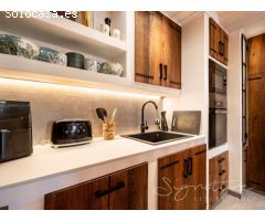 Exclusiva planta baja de diseño contemporáneo con terraza privada en la