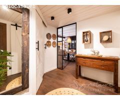 Exclusiva planta baja de diseño contemporáneo con terraza privada en la