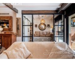 Exclusiva planta baja de diseño contemporáneo con terraza privada en la