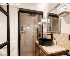 Exclusiva planta baja de diseño contemporáneo con terraza privada en la