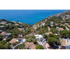 Villa Caleta - Estilo Ibicenco con Vistas Panorámicas al Mar Mediterráneo