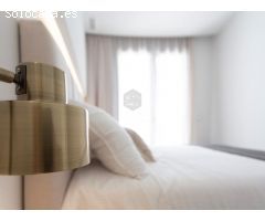 Moderno apartamento de 2 dormitorios con balcón privado