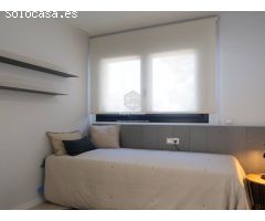 Moderno apartamento de 2 dormitorios con balcón privado