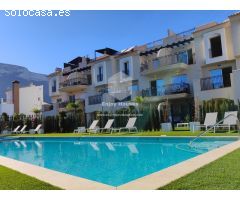 Apartamento en planta baja con jardín privado.