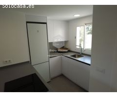 Apartamento en planta baja con jardín privado.