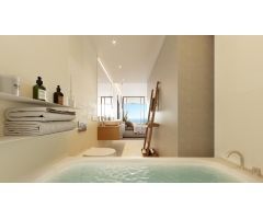 Apartamento planta baja de 2 dormitorios, jardín y vistas al mar en El Higuerón. Fuengirola