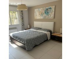 Bajo con terraza y piscina