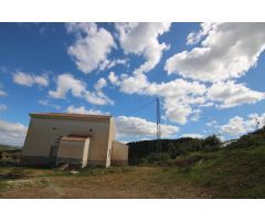 TERRENO RÚSTICO CON VIVIENDA