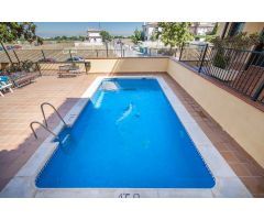 ¿Quiere vivir junto a Granada en una zona tranquila y bien comunicada en una urbanización con piscin
