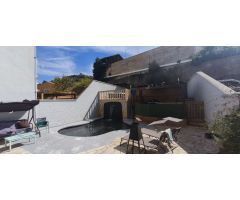 Adosado con piscina en cascada en Malaga