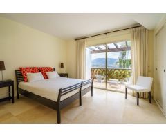 Fantástica Casa Adosada en venta con vistas y jardín en La Cala Resort, Mijas Costa
