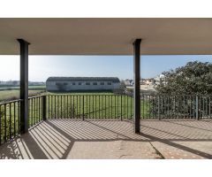 Casa con terreno y nave en Santa Fe